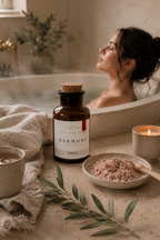 Woman relaxing in bath with Harmony botanical bath salts