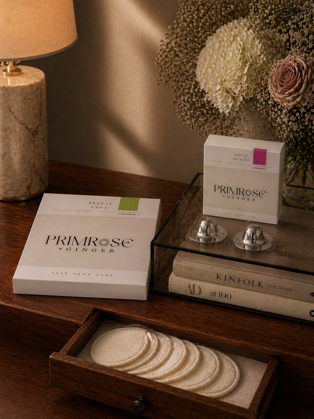 Breastfeeding care gift set with reusable nursing pads and pure silver nipple shields
