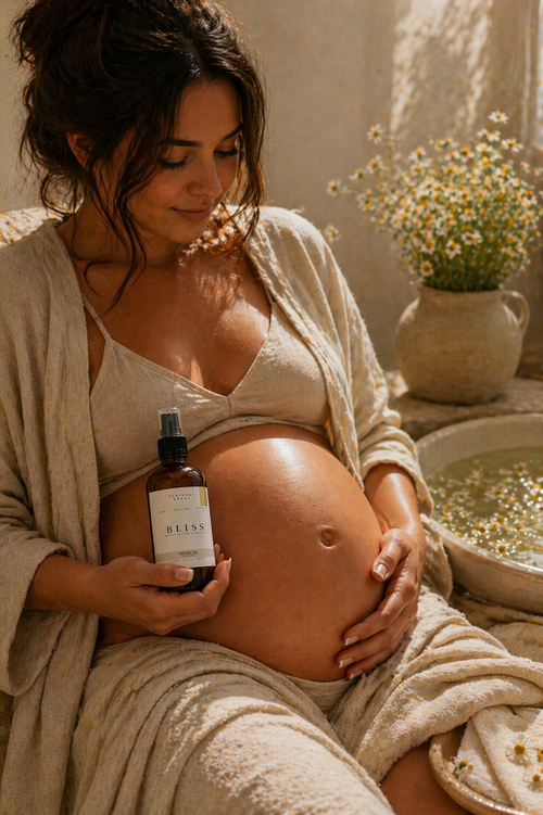 Pregnant woman using chamomile postpartum recovery spray during self care ritual